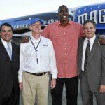 Orlando Magic Chief Operating Officer Alex Martins, AirTran Airways Sr. Vice President of Marketing and Planning Kevin Healy, Orlando Magic center Dwight Howard and AirTran Airways Chairman, CEO and President Bob Fornaro pose in front of the newest member of AirTran Airways' fleet, 'Magic 1.'