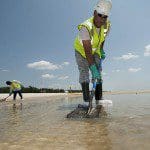 100731-G-0450H-075 - Response workers continue to clean beaches