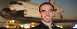 Mike Cantone with Shuttle Atlantis in background.  Cantone covered the final journey of Atlantis on November 3, 2012 (Photo: WONO)
