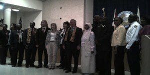 City of Orlando Commissioners pose with members of the Association to Preserve the Eatonville Community, major sponsors of ZORA! Festival, Eatonville Mayor Bruce Mount and  Russian participants in ZORA! Festival 2013, City Hall, January 28, 2013 (Photo: M. Cantone/WONO)