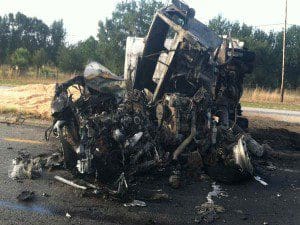 Photo courtesy - PCSO - Car in foreground (east bound lane) and the tractor.  The trailer extends into west bound lanes.