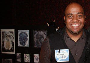 Matthew Sutto stands in front of his art work - RAW - Discovery event, The Abbey, downtown Orlando. February 7, 2013 (Photo: Racquel Cruz/WONO)
