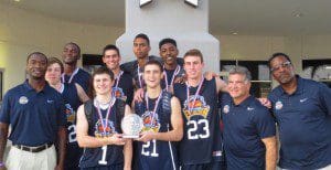 Trainer Iren Rainey (l) poses with AAU team Orlando Evolution, Robert Picerne and Don Miller. March 2013