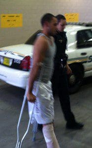 Edward C. McCoy being escorted by a Deputy Sheriff as he makes his way into the Polk County Sheriff's Office (Photo: PCSO)