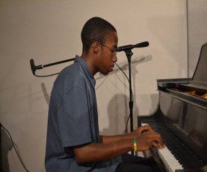 Joseph Styles performs at the Steinway Society of Central Florida Piano Gifting Celebration in Altamonte Springs, May 19, 2013. (Photo credit: Darlene Styles/WONO)