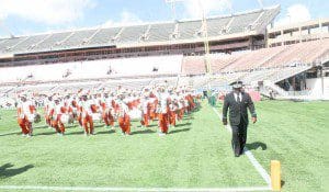 Dr. Sylvester Young accompanies his charges with a look of determination. (Photo credit: K. Turner?WONO)