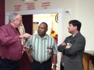 Tim Haberkamp, Hardee's business owner (l), Rev. Michael Kimbrough (c) and Jerry Presley, Executive Director, Pine Hills Neighborhood Improvement District, chat at the business association inaugural event, on October 15, 2013, Soiree Event & Conference Center, 6394 Silver Star Road, Orlando. (Photo: WONO).