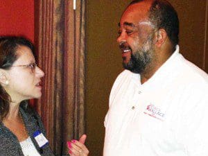 Derrick Wallace, candidate for Orange County Commissioner District 6, chats with Vivian Katz, real estate professional, at the Jewish Chamber of Commerce networking event, Citrus Restaurant, 821 N. Orange Avenue, Orlando, November 12, 2013 (Photo: WONO)