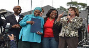 r-l: Mayor Teresa Jacobs, Orange County Commissioner, District 6, Tiffany Moore Russell and N.Y. Nathiri, Director of Multidisciplinary Programs, P.E.C.,  2014 Zora Festival. (Photo credit: Orange County Government) 
