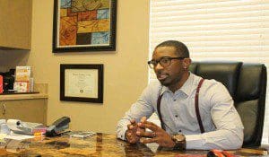 Akil Yisrael reflects on the service his firm provides in the community. (Karsceal Turner -WONO).