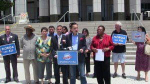 Orlando leaders and voting right's activists warn Gov. Rick Scott against suppressing minority voting in 2014 election, at a press conference, August 6, 2014. 