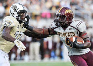 B-CU’s Anthony Jordan stiff-arms a UCF defender Saturday, September 20, courtesy:  B-CU Athletics)